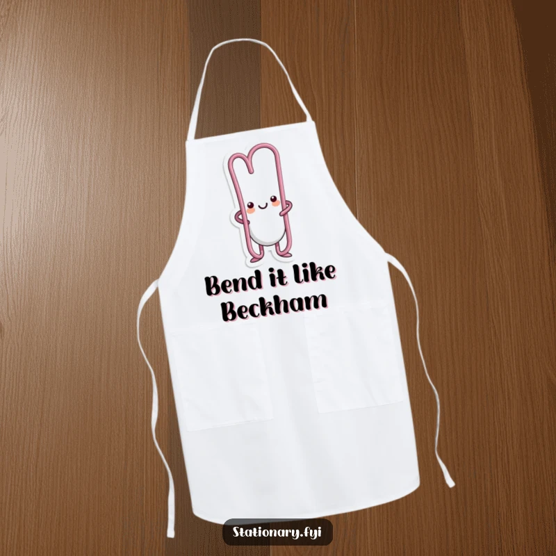 Funny kawaii paperclip character bending in a silly way on this humorous cooking apron.