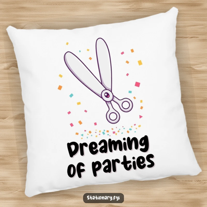 Funny pillow featuring giggling scissors cutting a stream of confetti, perfect for adding festive humor to comfort.