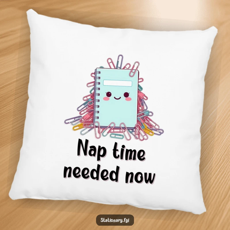 Funny Pillow: A miniature notebook attempting to navigate a colossal pile of paperclips, full of humorous charm.