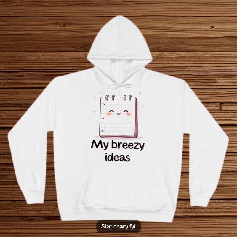 Funny hoodie featuring a happy notepad with pages fluttering in a gentle breeze, designed for comfort and creative inspiration.