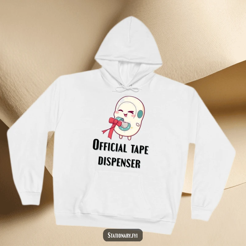 Funny hoodie with a winking tape dispenser character playfully dispensing a bright, festive ribbon, ideal for cozy laughs.