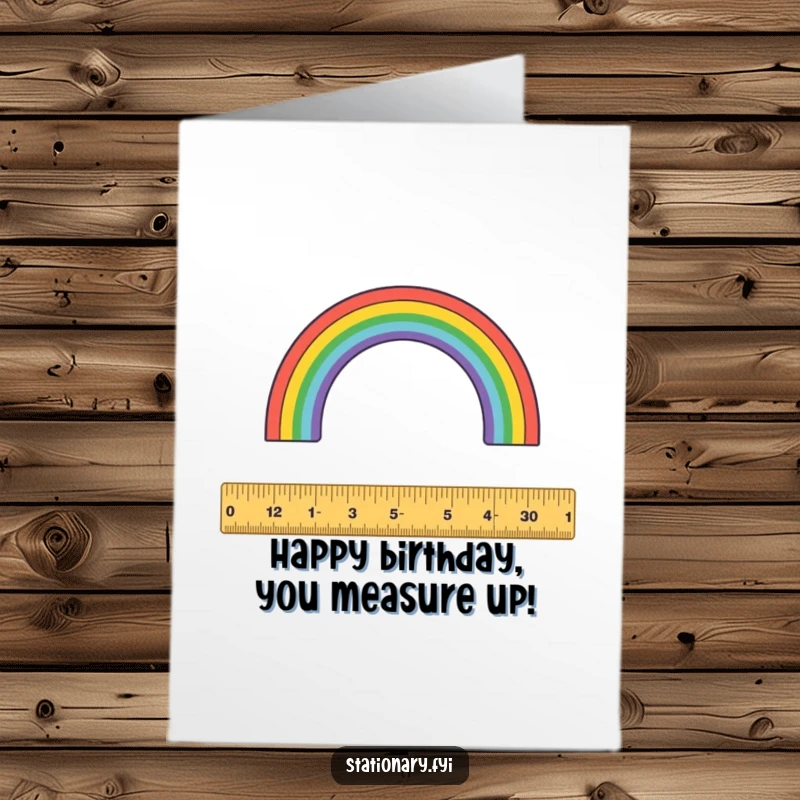 Funny Free Printable Birthday Card: A playful ruler measures a vibrant rainbow arc, celebrating birthdays with geometric glee. Downloadable art.