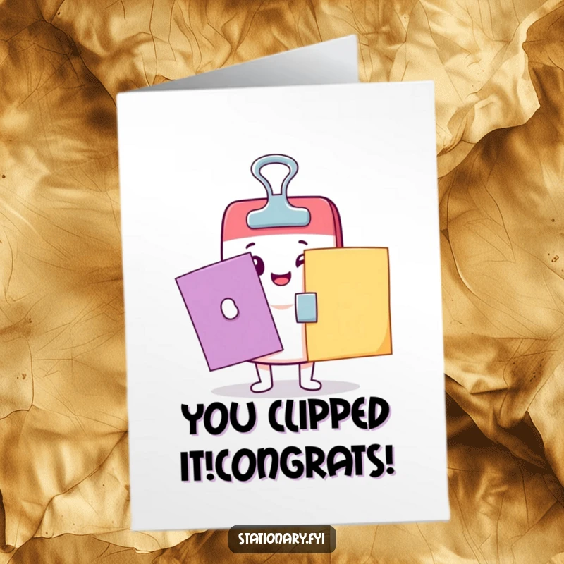 Funny Free Printable Kawaii binder clip character clamping papers, congratulating with office humor. A great downloadable card.