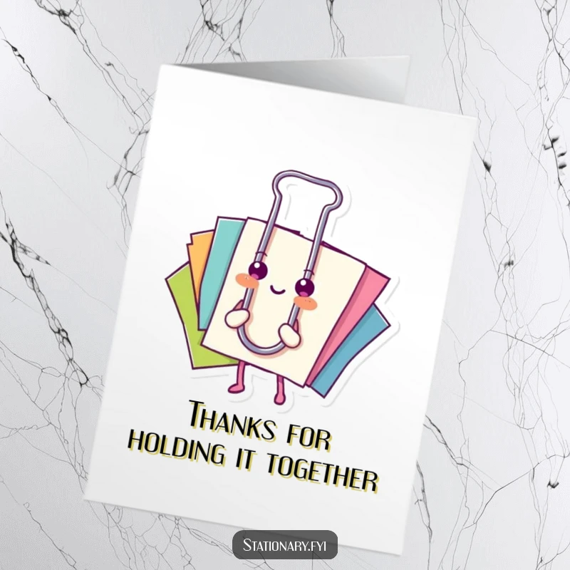 Funny Free Printable Thank You Card: A happy paperclip neatly holds colorful papers, expressing gratitude with efficiency. Downloadable art.