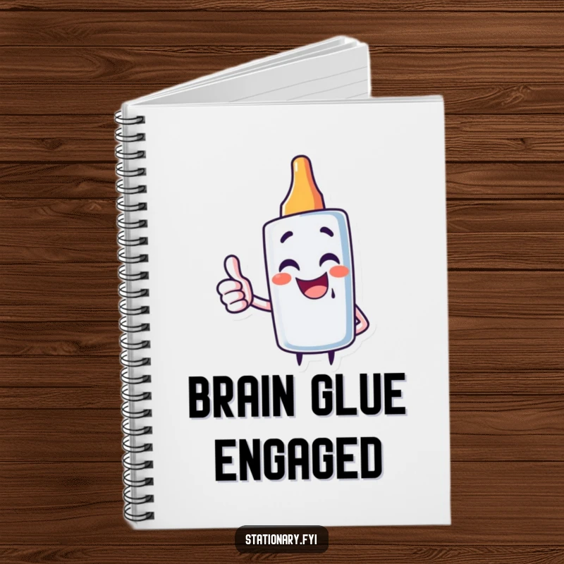 Funny notebook with a giggling glue stick character giving a thumbs up, ideal for jotting down creative ideas.