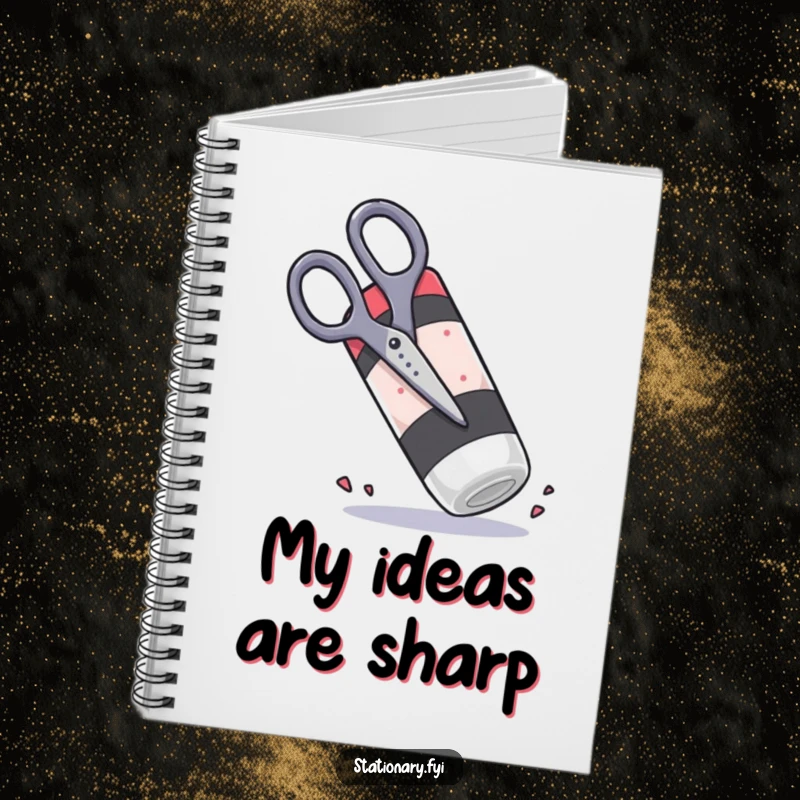 Funny scissors trying to cut a large rubbery eraser, a humorous notebook for jotting down creative ideas.