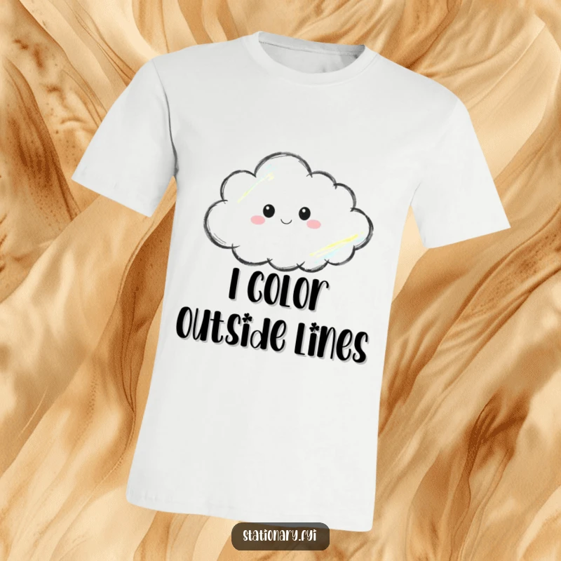 Funny t-shirt showcasing a crayon thoughtfully drawing a cloud, embodying artistic focus and gentle imagination.