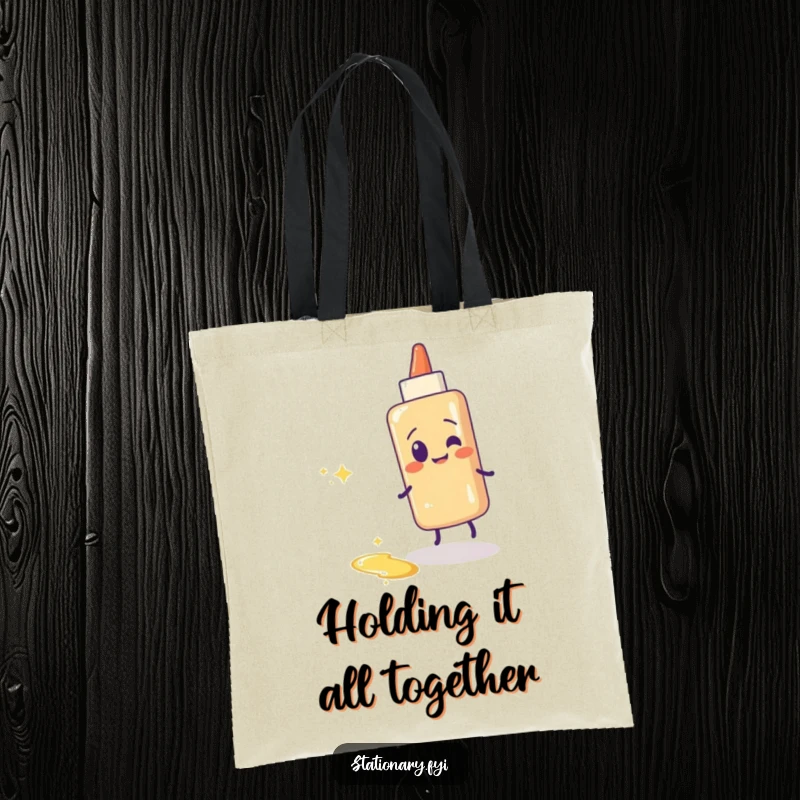 Funny glue stick tote bag featuring a giggling glue stick leaving a sparkly, sticky trail. Stylish and functional.