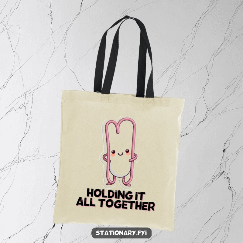 Funny kawaii paperclip character bending flexibly in a playful manner on this humorous tote bag.